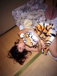  blanket breasts cleavage hanai_miri highres ns_eyes_337 photo stuffed_animal stuffed_toy tiger 