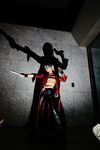  boots capcom cosplay dante devil_may_cry gun highres leather leather_pants overcoat pants photo reizi silver_hair weapon 