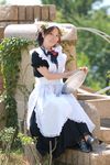  anya apron cosplay dog_ears highres maid maid_apron maid_uniform photo serving_tray tray 