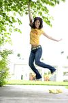  1girl asian barefoot belt denim highres jeans jumping looking_at_viewer nagasawa_nao nao_mail outdoors pants photo shirt t-shirt tshirt 