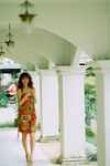  1girl asian brown_hair dress highres long_hair looking_at_viewer outdoors photo rosebud solo sugimoto_yumi 