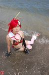  arm_warmers armwarmers beach bikini_top boots breasts chopsticks cleavage cosplay fingerless_gloves gloves kudou_rou ocean photo red_hair redhead scarf shorts tengen_toppa_gurren-lagann tengen_toppa_gurren_lagann thigh-highs thighhighs wet yoko_littner yoko_ritona 