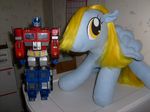  amber_eyes autobot blonde_hair cute cutie_mark derpy_hooves_(mlp) equine female friendship_is_magic hair happy looking_at_viewer my_little_pony optimus_prime pegasus plushie pony robot smile transformers wings 