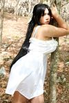  1girl asian black_hair breasts chouzuki_maryou dress female large_breasts outdoors photo plump solo standing 