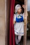  1girl apron bow braid cosplay curtain curtains door dress female highres izayoi_sakuya leaning lenfried looking_at_viewer photo solo thighhighs touhou 