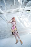  belt boots bracelet building cosplay female final_fantasy final_fantasy_xiii jewelry midriff necklace oerba_dia_vanille oerba_dia_vanille_(cosplay) photo pink_shirt shirt skirt solo standing twintails 