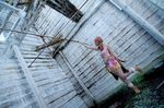  abandoned bracelet building cosplay female final_fantasy final_fantasy_xiii jewelry midriff necklace oerba_dia_vanille oerba_dia_vanille_(cosplay) photo pink_shirt plant plants ruins shirt skirt standing twintails 