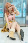  1girl beads belt boots bracelet cosplay door female final_fantasy final_fantasy_xiii high_heels jewelry looking_at_viewer midriff necklace oerba_dia_vanille oerba_dia_vanille_(cosplay) on_floor pink_shirt shirt sitting skirt solo twintails window 