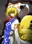 armband bad_id bad_pixiv_id blonde_hair brooch fox_tail glowing grey_background hat japanese_clothes jewelry long_sleeves looking_at_viewer multiple_tails myutsusama ofuda shadow short_hair smirk solo standing tabard tail tassel touhou yakumo_ran yellow_eyes 