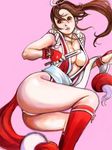  ass breasts brown_eyes brown_hair fan fatal_fury folding_fan kazaana large_breasts long_hair ponytail revealing_clothes shiranui_mai snk solo the_king_of_fighters 