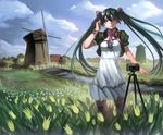  absurdres aqua_eyes aqua_hair bad_id bad_pixiv_id camera cropped_jacket dress hatsune_miku headphones highres long_hair looking_at_viewer scenery solo thighhighs twintails vocaloid white_dress windmill yykuaixian 