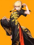  1girl ahoge artoria_pendragon_(fate) black_dress blonde_hair braid dougi dress eyebrows_hidden_by_hair fate/grand_order fate/stay_night fate_(series) fighting_stance floral_print french_braid hair_ribbon highres kung_fu leg_up looking_at_viewer orange_background ribbon saber_alter sidelocks simple_background tarte_(hodarake) yellow_eyes 