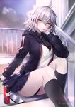  1girl absurdres ahoge blush breasts can cellphone drink_can fate/grand_order fate_(series) grey_hair hane_yuki highres jeanne_d&#039;arc_alter_(avenger)_(fate) jeanne_d&#039;arc_alter_(fate) kneehighs large_breasts long_sleeves looking_at_viewer phone school_uniform short_hair sitting skirt socks soda_can solo tongue tongue_out yellow_eyes 