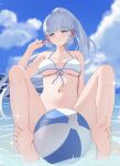  1girl absurdres alternate_costume ball barefoot beachball bikini blue_eyes blue_sky blunt_bangs blurry blush breasts cloud commentary_request day depth_of_field genshin_impact grey_hair hair_ornament halterneck hand_up highres kamisato_ayaka legs long_hair looking_at_viewer medium_breasts mole mole_under_eye ocean outdoors parted_lips partially_submerged pharmarr ponytail sitting sky solo stomach swimsuit tassel tassel_hair_ornament toes white_bikini 