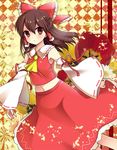  argyle argyle_background ascot bad_id bad_pixiv_id bare_shoulders blush brown_eyes brown_hair detached_sleeves hair_tubes hakurei_reimu highres long_hair looking_at_viewer nekosugi_(hoshi) solo touhou 