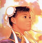  chun-li double_bun earrings jewelry mori_toshiaki realistic solo street_fighter 