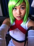  1girl asian cosplay fuu_(naruto) fuu_(naruto)_(cosplay) green_hair midriff naruto naruto_shippuuden photo solo 