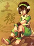  ankle_cuffs ankle_wrap avatar:_the_last_airbender avatar_(series) barefoot black_hair chinese_clothes cuffs dirty_feet feet hair_bun rock sitting smile soles solo toph_bei_fong white_eyes wrist_wrap 