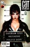  1girl batman_(series) black_hair breasts catwoman character_name cleavage dc_comics female gloves highres leather lipstick looking_at_viewer mugshot realistic solo zipper 