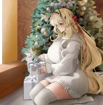  1girl absurdres barghest_(fate) blonde_hair blush box breasts christmas_tree dress fate/grand_order fate_(series) gift gift_box green_eyes hair_ribbon highres huge_breasts long_hair long_sleeves obazzotto ribbon seiza sitting smile solo sweater sweater_dress thighhighs white_sweater white_thighhighs 