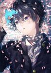  1boy black_hair blue_eyes cherry_blossoms dolphin free! hair_between_eyes high_speed! highres holding holding_toy looking_at_object male_focus nanase_haruka_(free!) omutarou parted_lips partially_submerged petals petals_on_liquid ripples school_uniform short_hair solo toy upper_body water wet wet_clothes wet_hair 