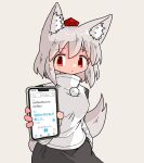  1girl animal_ear_fluff animal_ears cellphone closed_mouth grey_hair hat holding holding_phone inubashiri_momiji kasuya_baian light_blush long_sleeves looking_at_viewer phone pom_pom_(clothes) red_eyes short_hair smartphone solo tail tokin_hat touhou translation_request wolf_ears wolf_girl wolf_tail 