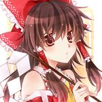  bow brown_hair gohei hair_bow hair_tubes hakurei_reimu looking_at_viewer lowres red_eyes shima_riu solo touhou 