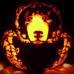  alan_lubeski alinraven ambiguous_gender art bear blow candle carving claws feral jack_o&#039;_lantern jack_o'_lantern looking_at_viewer mammal paws pumpkin sculpture 
