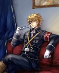 1boy armband belt blonde_hair blue_eyes boots couch eyepatch glasses gloves izac izac_(unlight) legs_crossed looking_at_viewer male male_focus military military_uniform nezumipl open_uniform painting_(object) red_upholstery short_hair sitting smile uniform unlight white_gloves 