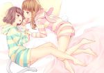 2girls :d animal_hood bangs barefoot bed_sheet blanket blunt_bangs brown_eyes brown_hair bunny_hood bunny_tail cat_hood cat_tail chin_rest commentary_request drawstring hand_holding hazuki_natsu hood hood_down interlocked_fingers long_hair long_sleeves looking_at_another lying multiple_girls on_side open_mouth original pajamas pillow red_eyes short_hair shorts smile striped striped_hoodie striped_shorts tail twitter_username yuri 