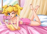 ass bed blonde_hair blue_earrings blue_eyes blush breasts crown earrings feet hands jewelry legs nintendo nintendo_ds open_mouth pillow princess_peach short_shorts shorts sigurd_hosenfeld sigurdhosenfeld super_mario_bros. toes twintails video_game wink 