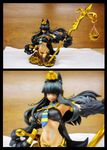  anubis anubis_(mamono_girl_lover) anubis_(monster_girl_encyclopedia) black_hair egyptian figure highres jewelry kenkou_cross lots_of_jewelry mamono_girl_lover monster_girl monster_girl_encyclopedia necktie smile staff statue sword weapon 