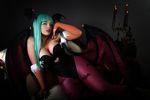  breasts candle cleavage cosplay couch demon_girl elbow_gloves freckles gloves green_eyes green_hair head_wings large_breasts lindze lips lipstick long_hair makeup morrigan_aensland pantyhose photo solo vampire_(game) wings 