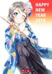  1girl 2019 arrow blue_eyes blush commentary_request floral_print flower grey_hair grin hair_flower hair_ornament hairband hairclip happy_new_year highres holding holding_arrow japanese_clothes kimono long_sleeves looking_at_viewer love_live! love_live!_sunshine!! new_year one_eye_closed rozen5 short_hair smile solo teeth watanabe_you wide_sleeves 