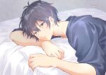  1boy given grey_background grey_hair grey_shirt hair_between_eyes highres holding holding_pillow looking_at_viewer male_focus murata_ugetsu on_bed open_mouth pillow shirt solo twitter_username umi8315 upper_body yellow_eyes 
