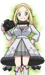  1girl blonde_hair breasts camera coat emapippi green_eyes hand_on_own_hip highres holding holding_camera large_breasts long_sleeves looking_at_viewer official_alternate_costume official_alternate_hairstyle pokemon pokemon_masters_ex solo teeth viola_(holiday_2023)_(pokemon) viola_(pokemon) white_coat 