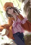  1girl absurdres bamboo blue_pants brown_eyes brown_hair cabbie_hat commentary cowboy_shot dutch_angle falling_leaves floating_hair girugiru_(tektonics6588) hands_up hat highres jacket jacket_on_shoulders leaf long_sleeves looking_to_the_side medium_hair monogatari_(series) orange_hat orange_jacket outdoors pants pink_shirt rope sengoku_nadeko shide shimenawa shirt solo standing tree twitter_username 