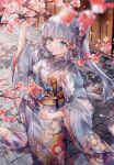  1girl alternate_costume blue_eyes blue_hair blue_kimono blunt_bangs blunt_tresses blurry blurry_foreground falling_petals floral_print flower genshin_impact hair_flower hair_ornament hand_up highres japanese_clothes kamisato_ayaka kimono long_hair long_sleeves looking_to_the_side looking_up outdoors parted_lips petals pink_flower sidelocks solo standing utsuhostoria 