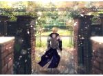  1boy armor arthur_pendragon_(fate) blonde_hair blurry brick_wall depth_of_field ebi_(6_5) falling_petals fate/grand_order fate_(series) from_behind gate highres hood hood_down letterboxed light_particles long_sleeves male_focus outdoors petals sabaton short_hair solo waist_cape 