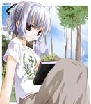  black_eyes book cloud copyright_request dated day hair_ribbon noto_(soranoto) ribbon short_hair sitting sky smile solo tree white_hair 