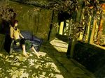  bad_id bad_pixiv_id barefoot brown_hair couch digital_media_player dutch_angle indoors ipod original overgrown plant shade short_hair sitting solo sunlight sunset tree tree_shade window window_shade yoshidaworks 