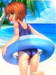  ahoge ass bare_shoulders barefoot beach brown_hair cardcaptor_sakura day from_behind green_eyes highres innertube kinomoto_sakura looking_back messy_hair mutsuki_(moonknives) one-piece_swimsuit open_mouth outdoors palm_tree school_swimsuit shiny shiny_clothes short_hair solo swimsuit tree water 