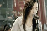  animated_gif band brown_hair drum drums eyes_closed guitar hood hoodie instrument jewelry live_action looking_at_viewer lowres medium_hair microphone music musician necklace photo shirt singing watermark white_shirt yoshioka_yui yui_(singer) 