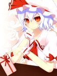  ascot blouse blue_hair blush bow box chocolate fingernails hair_between_eyes hand_on_own_cheek hat hat_bow highres junior27016 looking_at_viewer mob_cap pink_shirt puffy_sleeves red_eyes remilia_scarlet ribbon shirt short_sleeves smile solo table touhou valentine wrist_cuffs 