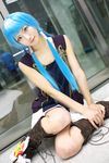  black_eyes blue_hair boots cosplay hair_tubes kannagi nagi non-web_source on_floor photo sitting sleeveless solo 