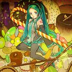  :p aqua_hair candy candy_cane cookie food hatsune_miku long_hair lowres na2 pocky solo thighhighs tongue tongue_out twintails very_long_hair vocaloid zettai_ryouiki 