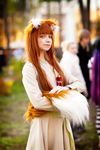  anastasiya_reznikova animal_ears animal_tail animated animated_gif brown_eyes brown_hair cosplay holo holo_(cosplay) looking_at_viewer photo smile spice_and_wolf tail touching traditional_clothes 