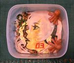  commentary_request food food_art kayu kyaraben lowres megurine_luka obentou photo solo tako-san_wiener takoluka unconventional_media vocaloid 