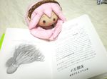  bad_id bad_pixiv_id book book_focus megurine_luka no_humans photo squid studying stuffed_toy takoluka vocaloid 