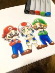  1girl 2boys :d agatsuma_zenitsu black_hair blonde_hair blue_hair blue_overalls brown_hair cosplay facial_hair gloves green_headwear green_sweater highres kamado_nezuko kamado_tanjirou kimetsu_no_yaiba luigi luigi_(cosplay) mario mario_(cosplay) mario_(series) maru_(zenmaru0903) multicolored_hair multiple_boys mustache overalls pen red_headwear red_sweater short_hair smile sweater toad_(mario) toad_(mario)_(cosplay) traditional_media two-tone_hair white_gloves 